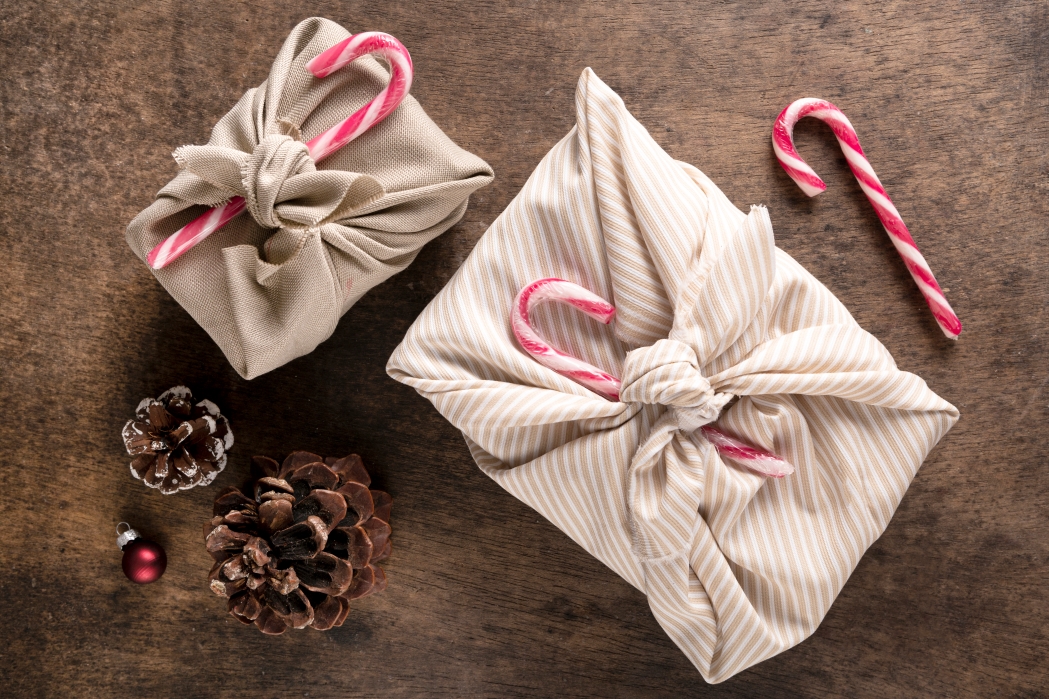 festive still life christmas wrapped gift arrangement