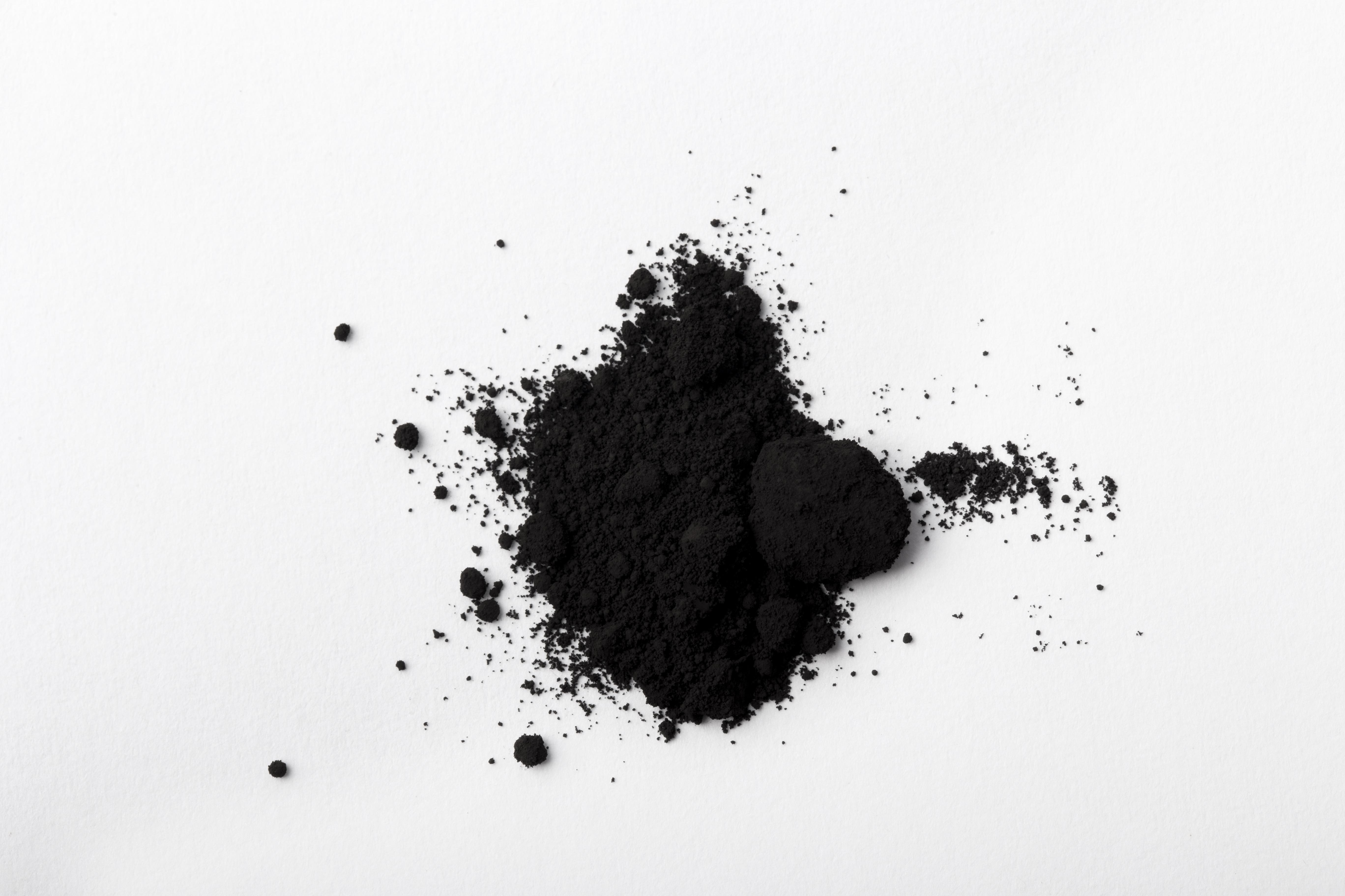 still life black toner arrangement isolated